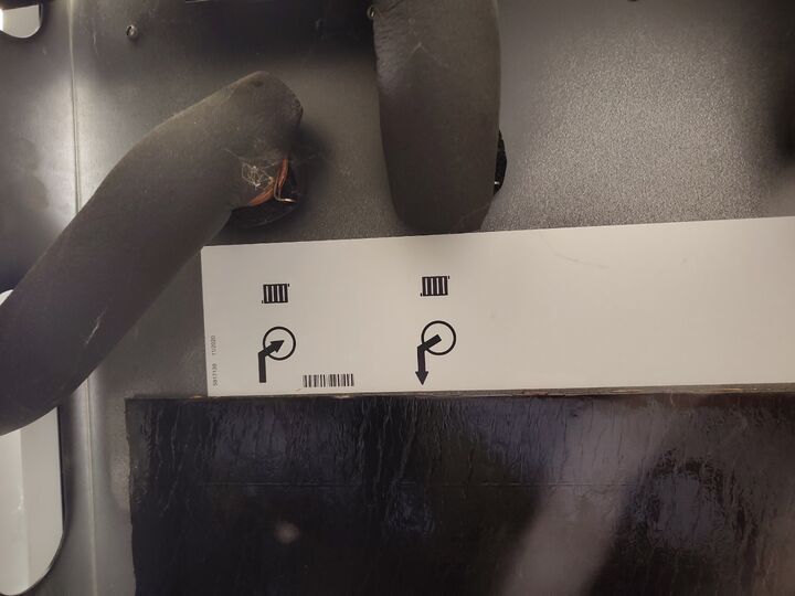 Rear heat-pump ports · left-hand half. Rear-left half of paired panorama.