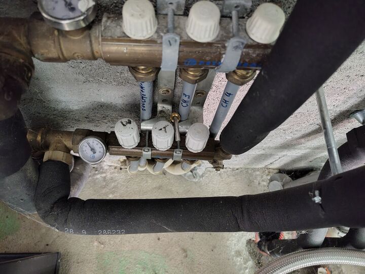Lower manifold plus paired upstairs branches. Lower-floor manifold · overhead context.